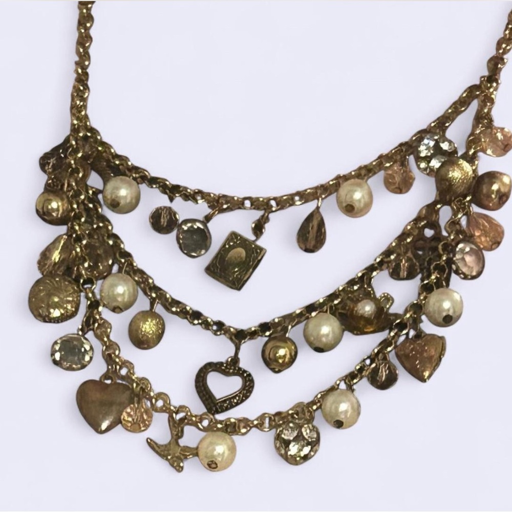 Vintage Gold Layered Charm Necklace with Intricate Details
